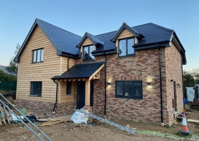 8″ Feather Edge Cladding, post and fascias all in western red cedar